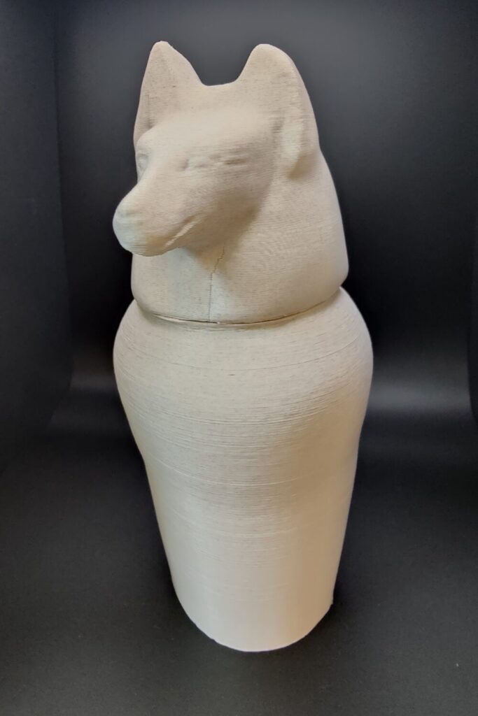 3D printed canopic jar with a jackal head.