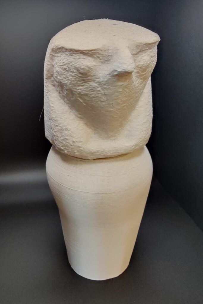 3D printed canopic jar with a falcon head.